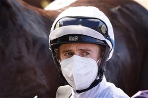 SYDNEY, AUSTRALIA - JULY 24: Brock Ryan on So Say You returns to scale after winning race 2 the TAB Highway Class 3 Plate during Sydney Racing at Rosehill Gardens on July 24, 2021 in Sydney, Australia. (Photo by Mark Evans/Getty Images)
