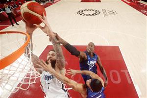 SAITAMA, JAPAN - JULY 25: Vincent Poirier #17 of Team France pulls down a rebound over Bam Adebayo #13 of Team United States during the first half of the Men's Preliminary Round Group B game on day two of the Tokyo 2020 Olympic Games at Saitama Super Arena on July 25, 2021 in Saitama, Japan. (Getty Images)
