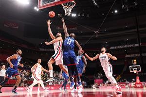 SAITAMA, JAPAN - JULY 25: Evan Fournier #10 of Team France drives to the basket for a shot over Draymond Green #14 of Team United States during the second half of the Men's Preliminary Round Group B game on day two of the Tokyo 2020 Olympic Games at Saitama Super Arena on July 25, 2021 in Saitama, Japan. (Getty Images)