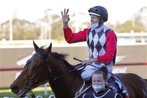 SYDNEY, AUSTRALIA - JULY 24: Hugh Bowman on Casino Mondial (red sleeves) returns to scale after winning race 8 the Midway Handicap during Sydney Racing at Rosehill Gardens on July 24, 2021 in Sydney, Australia. (Photo by Mark Evans/Getty Images)