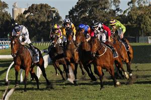 SYDNEY, AUSTRALIA - JULY 24: Hugh Bowman on Casino Mondial (red sleeves) wins race 8 the Midway Handicap during Sydney Racing at Rosehill Gardens on July 24, 2021 in Sydney, Australia. (Photo by Mark Evans/Getty Images)