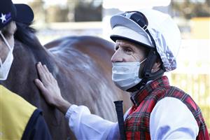 SYDNEY, AUSTRALIA - JULY 24: Hugh Bowman on Order Again returns to scale after winning race 7 the XXXX Winter Challenge during Sydney Racing at Rosehill Gardens on July 24, 2021 in Sydney, Australia. (Photo by Mark Evans/Getty Images)
