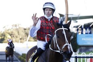 SYDNEY, AUSTRALIA - JULY 24: Hugh Bowman on Order Again returns to scale after winning race 7 the XXXX Winter Challenge during Sydney Racing at Rosehill Gardens on July 24, 2021 in Sydney, Australia. (Photo by Mark Evans/Getty Images)