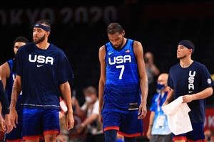SAITAMA, JAPAN - JULY 25: Kevin Durant #7 and JaVale McGee #11 of Team United States walk off the court after the United States lost to France in the Men's Preliminary Round Group B game on day two of the Tokyo 2020 Olympic Games at Saitama Super Arena on July 25, 2021 in Saitama, Japan. (Getty Images)