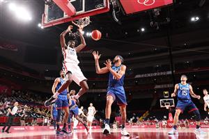 SAITAMA, JAPAN - JULY 25: Moustapha Fall #93 of Team France dunks the ball over JaVale McGee #11 of Team United States during the second half of the Men's Preliminary Round Group B game on day two of the Tokyo 2020 Olympic Games at Saitama Super Arena on July 25, 2021 in Saitama, Japan. (Getty Images)