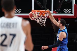 USA's Zachary Lavine scores a basket in the men's preliminary round group A basketball match between France and USA during the Tokyo 2020 Olympic Games at the Saitama Super Arena in Saitama on July 25, 2021. (Getty Images)