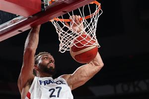 France's Rudy Gobert scores a basket in the men's preliminary round group A basketball match between France and USA during the Tokyo 2020 Olympic Games at the Saitama Super Arena in Saitama on July 25, 2021. (Getty Images)