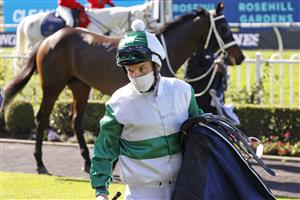 SYDNEY, AUSTRALIA - JULY 24: Tim Clark on Silent Impact returns to scale after winning race 1 the Elite Sand & Soil Handicap during Sydney Racing at Rosehill Gardens on July 24, 2021 in Sydney, Australia. (Photo by Mark Evans/Getty Images)