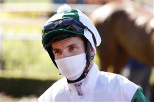 SYDNEY, AUSTRALIA - JULY 24: Tim Clark on Silent Impact returns to scale after winning race 1 the Elite Sand & Soil Handicap during Sydney Racing at Rosehill Gardens on July 24, 2021 in Sydney, Australia. (Photo by Mark Evans/Getty Images)