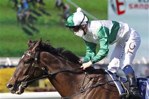 SYDNEY, AUSTRALIA - JULY 24: Tim Clark on Silent Impact (green/white) wins race 1 the Elite Sand & Soil Handicap during Sydney Racing at Rosehill Gardens on July 24, 2021 in Sydney, Australia. (Photo by Mark Evans/Getty Images)
