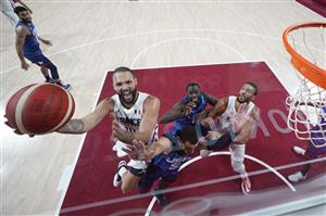 SAITAMA, JAPAN - JULY 25: Evan Fournier #10 of Team France drives to the basket against Zachary Lavine #5 of Team United States during the first half of the Men's Preliminary Round Group B game on day two of the Tokyo 2020 Olympic Games at Saitama Super Arena on July 25, 2021 in Saitama, Japan. (Getty Images)