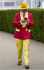 CHICHESTER, ENGLAND - JULY 27: A smartly dressed gentleman during the Qatar Goodwood Festival at Goodwood Racecourse on July 27, 2021 in Chichester, England. (Photo by Alan Crowhurst/Getty Images)