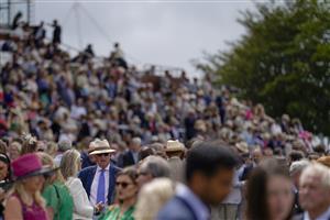 CHICHESTER, ENGLAND - JULY 27: A large crowd during the Qatar Goodwood Festival at Goodwood Racecourse on July 27, 2021 in Chichester, England. (Photo by Alan Crowhurst/Getty Images)