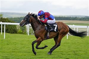 CHICHESTER, ENGLAND - JULY 27: William Buick riding Lovely Breeze win The World Pool EBF Fillies' Handicap during the Qatar Goodwood Festival at Goodwood Racecourse on July 27, 2021 in Chichester, England. (Photo by Alan Crowhurst/Getty Images)