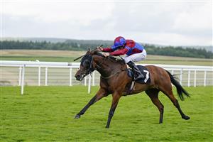 CHICHESTER, ENGLAND - JULY 27: William Buick riding Lovely Breeze win The World Pool EBF Fillies' Handicap during the Qatar Goodwood Festival at Goodwood Racecourse on July 27, 2021 in Chichester, England. (Photo by Alan Crowhurst/Getty Images)