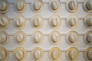 CHICHESTER, ENGLAND - JULY 28: Panama hats for sale in the shop during the Qatar Goodwood Festival at Goodwood Racecourse on July 28, 2021 in Chichester, England. (Photo by Alan Crowhurst/Getty Images)