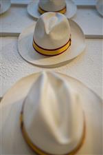CHICHESTER, ENGLAND - JULY 28: Panama hats for sale in the shop during the Qatar Goodwood Festival at Goodwood Racecourse on July 28, 2021 in Chichester, England. (Photo by Alan Crowhurst/Getty Images)