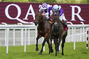 CHICHESTER, ENGLAND - JULY 28: Oisin Murphy riding Alcohol Free (R) win The Qatar Sussex Stakes from Poetic Flare and Kevin Manning (L) during the Qatar Goodwood Festival at Goodwood Racecourse on July 28, 2021 in Chichester, England. (Photo by Alan Crowhurst/Getty Images)