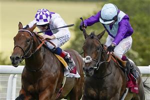 CHICHESTER, ENGLAND - JULY 28: Oisin Murphy riding Alcohol Free (R) win The Qatar Sussex Stakes from Poetic Flare and Kevin Manning (L) during the Qatar Goodwood Festival at Goodwood Racecourse on July 28, 2021 in Chichester, England. (Photo by Alan Crowhurst/Getty Images)