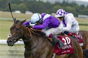 CHICHESTER, ENGLAND - JULY 28: Oisin Murphy riding Alcohol Free (L) win The Qatar Sussex Stakes from Poetic Flare and Kevin Manning (R) during the Qatar Goodwood Festival at Goodwood Racecourse on July 28, 2021 in Chichester, England. (Photo by Alan Crowhurst/Getty Images)