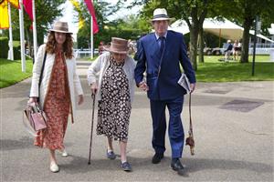CHICHESTER, ENGLAND - JULY 29: Rebekah Brooks (L) is a British media executive and former journalist and newspaper editor with husband Charlie Brooks with one of their parents arrive during the Qatar Goodwood Festival at Goodwood Racecourse on July 29, 2021 in Chichester, England. (Photo by Alan Crowhurst/Getty Images)