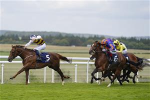 CHICHESTER, ENGLAND - JULY 29: Ben Coen riding Ottoman Emperor (L) win The John Pearce Racing Gordon Stakes during the Qatar Goodwood Festival at Goodwood Racecourse on July 29, 2021 in Chichester, England. (Photo by Alan Crowhurst/Getty Images)