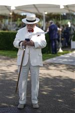 CHICHESTER, ENGLAND - JULY 29: Racegoer during the Qatar Goodwood Festival at Goodwood Racecourse on July 29, 2021 in Chichester, England. (Photo by Alan Crowhurst/Getty Images)