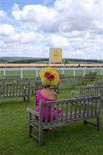 CHICHESTER, ENGLAND - JULY 29: Fashion on Ladies Day during the Qatar Goodwood Festival at Goodwood Racecourse on July 29, 2021 in Chichester, England. (Photo by Alan Crowhurst/Getty Images)