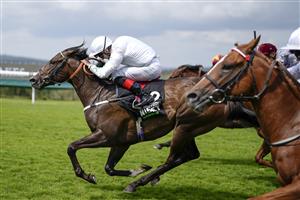 CHICHESTER, ENGLAND - JULY 29: Martin Harley riding Asymmetric (white) win The Unibet Richmond Stakes during the Qatar Goodwood Festival at Goodwood Racecourse on July 29, 2021 in Chichester, England. (Photo by Alan Crowhurst/Getty Images)