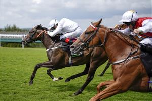 CHICHESTER, ENGLAND - JULY 29: Martin Harley riding Asymmetric (white) win The Unibet Richmond Stakes during the Qatar Goodwood Festival at Goodwood Racecourse on July 29, 2021 in Chichester, England. (Photo by Alan Crowhurst/Getty Images)