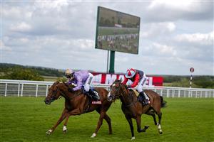 CHICHESTER, ENGLAND - JULY 29: Thea Gosden Hood riding She Got The Jockey (L) dead heat with Candida Crawford riding Mine Behind (R) in The Magnolia Cup during the Qatar Goodwood Festival at Goodwood Racecourse on July 29, 2021 in Chichester, England. (Photo by Alan Crowhurst/Getty Images)