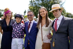 CHICHESTER, ENGLAND - JULY 29: L-R, Catherine Dettori, Ella Dettori, Frankie Dettori, Mia Dettori and Leo Dettori in the parade ring before The Magnolia Cup race during the Qatar Goodwood Festival at Goodwood Racecourse on July 29, 2021 in Chichester, England. (Photo by Alan Crowhurst/Getty Images)