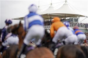 CHICHESTER, ENGLAND - JULY 30: A general view as runners line up for the start of The Unibet 3 Boosts A Day Goodwood Handicap during the Qatar Goodwood Festival at Goodwood Racecourse on July 30, 2021 in Chichester, England. (Photo by Alan Crowhurst/Getty Images)