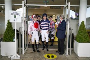 CHICHESTER, ENGLAND - JULY 30: A general view as jockeys leave the weighing room for the last race of the day during the Qatar Goodwood Festival at Goodwood Racecourse on July 30, 2021 in Chichester, England. (Photo by Alan Crowhurst/Getty Images)