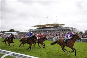 CHICHESTER, ENGLAND - JULY 30: Pat Dobbs riding Calling The Wind win The Unibet 3 Boosts A Day Goodwood Handicap during the Qatar Goodwood Festival at Goodwood Racecourse on July 30, 2021 in Chichester, England. (Photo by Alan Crowhurst/Getty Images)