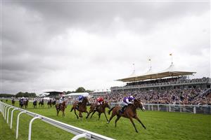 CHICHESTER, ENGLAND - JULY 30: Pat Dobbs riding Calling The Wind win The Unibet 3 Boosts A Day Goodwood Handicap during the Qatar Goodwood Festival at Goodwood Racecourse on July 30, 2021 in Chichester, England. (Photo by Alan Crowhurst/Getty Images)