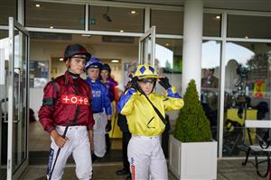 CHICHESTER, ENGLAND - JULY 30: Hollie Doyle (R) leaves the weighing room during the Qatar Goodwood Festival at Goodwood Racecourse on July 30, 2021 in Chichester, England. (Photo by Alan Crowhurst/Getty Images)