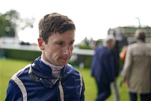 CHICHESTER, ENGLAND - JULY 30: Oisin Murphy returns to the weighing room during the Qatar Goodwood Festival at Goodwood Racecourse on July 30, 2021 in Chichester, England. (Photo by Alan Crowhurst/Getty Images)