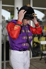 CHICHESTER, ENGLAND - JULY 30: Ryan Moore in the Queen's colours during the Qatar Goodwood Festival at Goodwood Racecourse on July 30, 2021 in Chichester, England. (Photo by Alan Crowhurst/Getty Images)