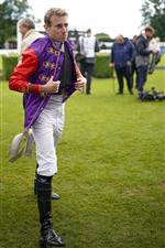 CHICHESTER, ENGLAND - JULY 30: Ryan Moore in the Queen's colours during the Qatar Goodwood Festival at Goodwood Racecourse on July 30, 2021 in Chichester, England. (Photo by Alan Crowhurst/Getty Images)