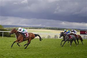 CHICHESTER, ENGLAND - JULY 30: William Buick riding Suesa (L) win The King George Qatar Stakes during the Qatar Goodwood Festival at Goodwood Racecourse on July 30, 2021 in Chichester, England. (Photo by Alan Crowhurst/Getty Images)