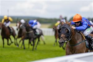 CHICHESTER, ENGLAND - JULY 31: Jason Hart riding Mr Wagyu (orange cap) win The Unibet Stewards' Sprint Handicap during the Qatar Goodwood Festival at Goodwood Racecourse on July 31, 2021 in Chichester, England. (Photo by Alan Crowhurst/Getty Images)