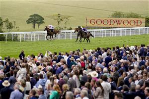 CHICHESTER, ENGLAND - JULY 31: Rossa Ryan riding Prince Alex (R, purple) win The Summer Handicap during the Qatar Goodwood Festival at Goodwood Racecourse on July 31, 2021 in Chichester, England. (Photo by Alan Crowhurst/Getty Images)