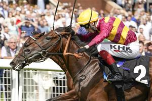 NEWBURY, ENGLAND - AUGUST 14: William Buick riding Masekela (farside) win The Academy Insurance British EBF Maiden Stakes from David Egan and Bayside Boy (nearest) at Newbury Racecourse on August 14, 2021 in Newbury, England. (Photo by Alan Crowhurst/Getty Images)