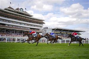 NEWBURY, ENGLAND - AUGUST 14: Tom Marquand riding Sacred (red) win The BetVictor Hungerford Stakes at Newbury Racecourse on August 14, 2021 in Newbury, England. (Photo by Alan Crowhurst/Getty Images)