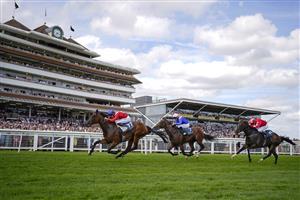 NEWBURY, ENGLAND - AUGUST 14: Tom Marquand riding Sacred (red) win The BetVictor Hungerford Stakes at Newbury Racecourse on August 14, 2021 in Newbury, England. (Photo by Alan Crowhurst/Getty Images)