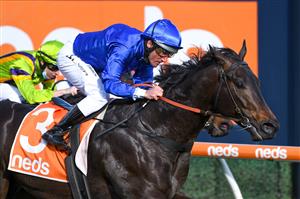 MELBOURNE, AUSTRALIA - AUGUST 14: Damien Oliver riding Ingratiating winning race 6, the Neds Vain Stakes, during Melbourne Racing at Caulfield Racecourse on August 14, 2021 in Melbourne, Australia. (Photo by Vince Caligiuri/Getty Images)