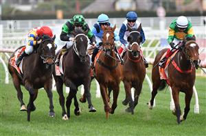 MELBOURNE, AUSTRALIA - AUGUST 14: Dean Yendall riding So You Assume winning race 1 , the Thank You Mrc Members Handicap, during Melbourne Racing at Caulfield Racecourse on August 14, 2021 in Melbourne, Australia. (Photo by Vince Caligiuri/Getty Images)