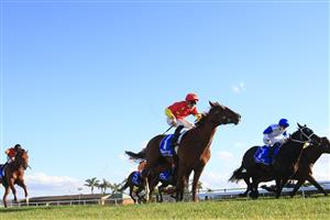 KEMBLA, AUSTRALIA - AUGUST 14: James McDonald (red cap) on Tiger of Malay wins race 8 the Darley Up And Coming Stakes during Sydney Racing at Kembla Grange on August 14, 2021 in Kembla, Australia. (Photo by Mark Evans/Getty Images)