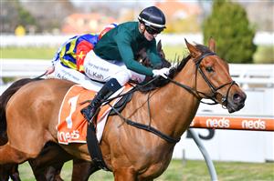 MELBOURNE, AUSTRALIA - AUGUST 14: Jamie Kah riding Second Slip winning Race 3, the Neds Filter Form Handicap, during Melbourne Racing at Caulfield Racecourse on August 14, 2021 in Melbourne, Australia. (Photo by Vince Caligiuri/Getty Images)